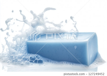 Purple soap bar in foam splash. Wet Soap and water splashes isolated on white background. Natural soap bar with bubbles. Mockup for design. Soap foam. Eco bio cosmetics, hygiene and beauty concept. 127249452