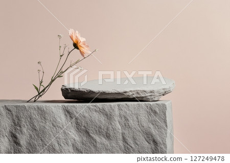 Big Stone as a Podium. Pink Flower. Beige Background for for Cosmetic, Soap, Items Presentation. Abstract Minimal Geometric Pedestal. Soft Shadow. Show Product, Object. Showcase, Display Case. Stand 127249478