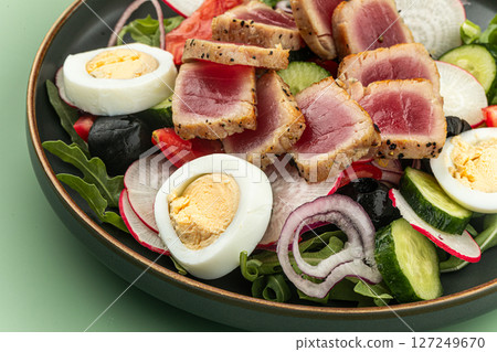 Portion of nicoise salad with tuna fish and eggs Portion of nicoise salad with tuna fish and eggs 127249670