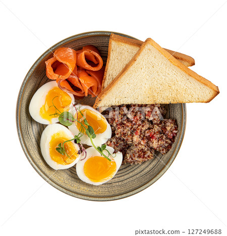 Isolated bowl with eggs salmon and quinoa 127249688