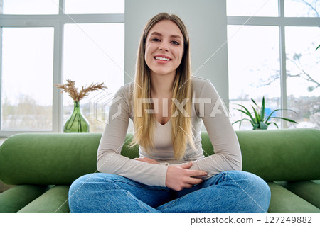 Web cam view of young woman talking looking in camera, online meeting, video call Web cam view of young woman talking looking in camera, online meeting, video call 127249882