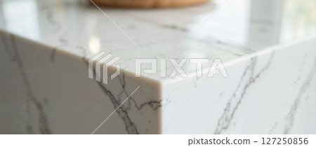 Luxury white marble kitchen island with soft lighting Luxury white marble kitchen island with soft lighting 127250856