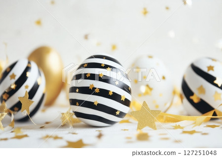Gold, black decorated Easter eggs group, white solid background. Geometric pattern. Minimal Easter Card concept. Place for text. Stylish shiny golden egg decorative painted. Trendy Easter eggs poster Gold, black decorated Easter eggs group, white solid background. Geometric pattern. Minimal Easter Card concept. Place for text. Stylish shiny golden egg decorative painted. Trendy Easter eggs poster 127251048