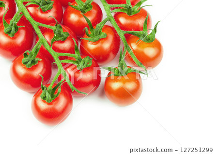 Branches of fresh cherry tomatoes isolated on white 127251299