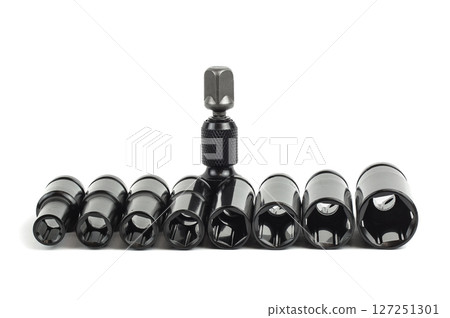 Top view of a set of chrome vanadium sockets for a ratchet, wrench, or spanner, isolated on white background. 127251301