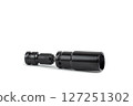 A ratchet and a set of interchangeable heads for a chrome-plated socket wrench. Isolated on a white background 127251302