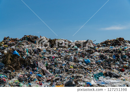 Mountains of trash at a landfill show plastic debris and waste that harm the environment and highlight the need for better waste management practices Mountains of trash at a landfill show plastic debris and waste that harm the environment and highlight the need for better waste management practices 127251398