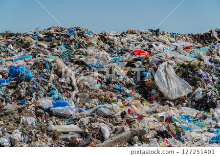 Mountains of plastic and debris litter the landfill, showcasing the growing problem of pollution and the need for environmental action Mountains of plastic and debris litter the landfill, showcasing the growing problem of pollution and the need for environmental action 127251401