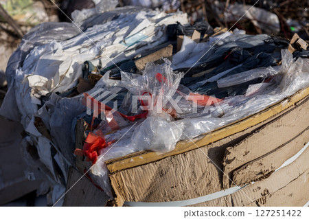 Collected plastic and debris are piled at a landfill, highlighting ongoing pollution and the urgent need for effective waste management solutions Collected plastic and debris are piled at a landfill, highlighting ongoing pollution and the urgent need for effective waste management solutions 127251422