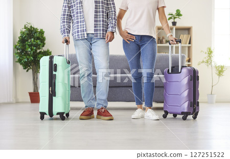Family couple ready for summer vacation happy packing suitcase, luggage wheel bag together, planning 127251522
