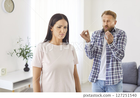 Married man and woman with relationship problems are arguing and quarreling at home 127251540