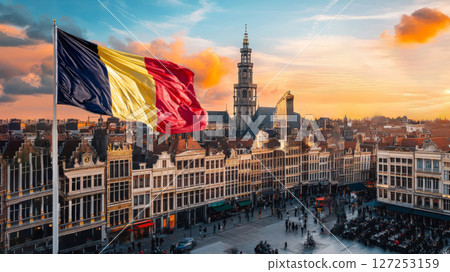 Belgian flag waves proudly against a beautiful sunset in the heart of Brussels on independence day 127253159