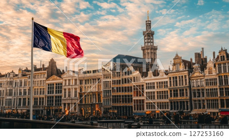 Belgian flag waves proudly against a beautiful sunset in the heart of Brussels on independence day 127253160