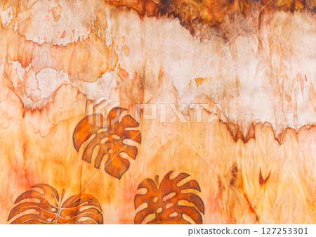 abstract pattern on silk fabric texture in yellow and brown tones 127253301