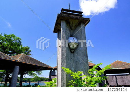 Rest area and railings at Lake Sayama, an artificial lake in Saitama Prefecture 127254124