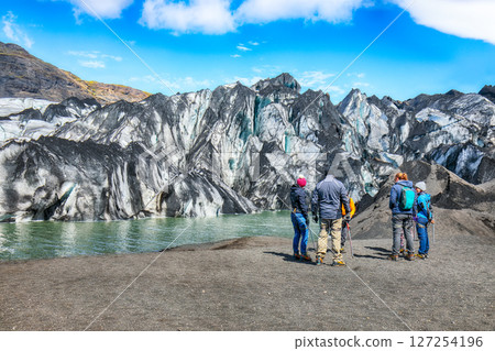 Impressive view on Solheimajokull glacier in Katla Geopark on Icelandic Atlantic South Coast Impressive view on Solheimajokull glacier in Katla Geopark on Icelandic Atlantic South Coast 127254196