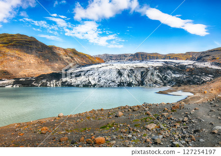 Impressive view on Solheimajokull glacier in Katla Geopark on Icelandic Atlantic South Coast 127254197