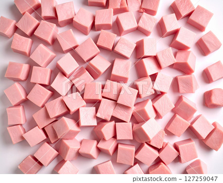 AI generated top view of fresh raw pork meat cut into chunks from various parts neatly arranged vibrant pink color on clean white background 127259047