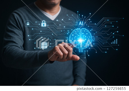 AI generated image showing a man controlling a glowing digital brain with holographic interface and connected icons representing AI systems and data networks. 127259855
