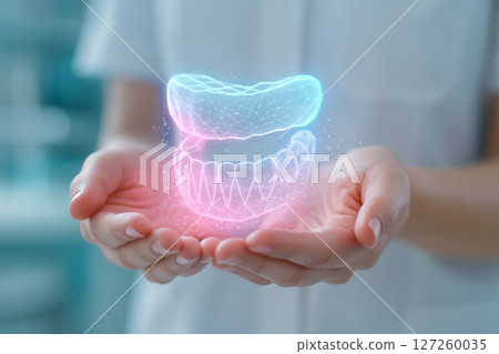 AI generated A digital hologram of lower jaw floats above hands symbolizing precision technology and compassionate dental care in a modern clinical setting 127260035