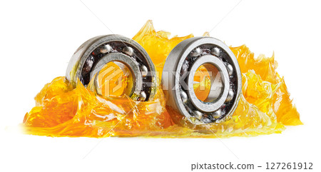 Grease and ball bearing isolated on white background. 127261912
