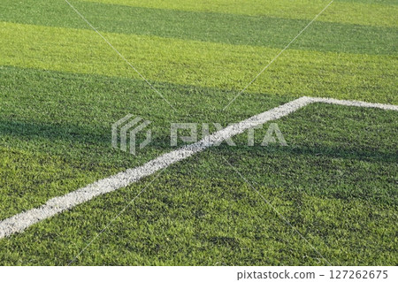 artificial green grass turf sport soccer field with black rubber granules infill 127262675