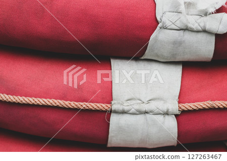 Red lifebuoys background 127263467