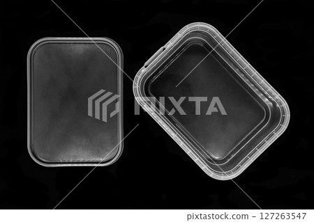Transparent plastic box bottom separated from lid and isolated on black background surface 127263547