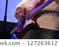 Hands of a man playing the bass 127263612