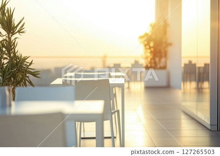 Modern Rooftop Dining with Sunlit Ambiance and City Skyline View 127265503