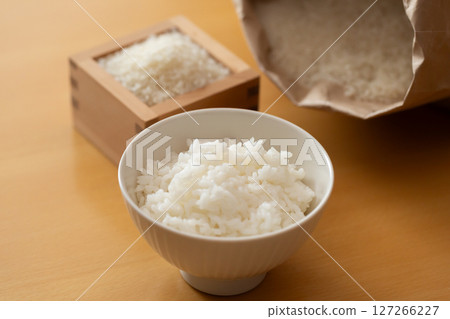 Rice and white rice in bowls on the table 127266227