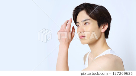 Man styling his hair Beauty image Man styling his hair Beauty image 127269625