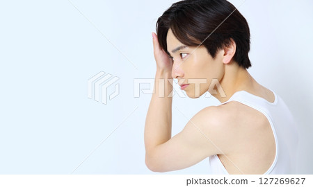 Man styling his hair Beauty image Man styling his hair Beauty image 127269627