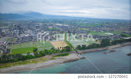 A view of the sea near Asahimachi Seaside Park in Toyama Prefecture during the rainy season 127270041
