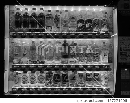 Close-up of a vending machine. Night. Black and white. 127271906