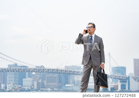 City businessman, building, sky City businessman, building, sky 127272488