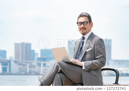 City businessman, building, computer City businessman, building, computer 127272741