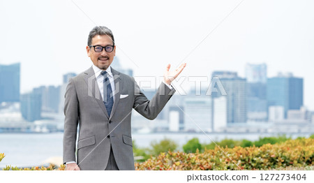 City businessman, buildings 127273404