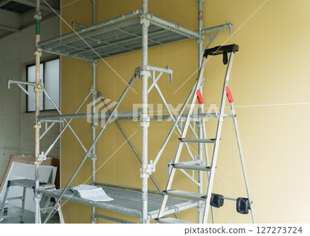 Construction site scaffolding 127273724