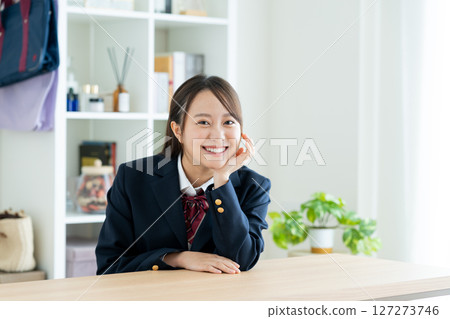 High school girl relaxing in a room High school girl relaxing in a room 127273746