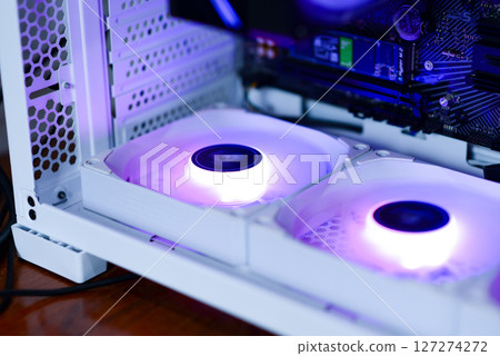 Inside the computer and devices boards fans RAM SSD Inside the computer and devices boards fans RAM SSD 127274272