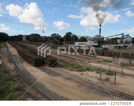 Sugar factory and sugar cane train, Bruce Hwy, Home Hill QLD 4806 Australia Sugar factory and sugar cane train, Bruce Hwy, Home Hill QLD 4806 Australia 127275019