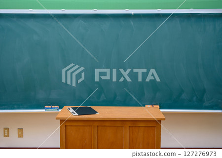 Classroom blackboard and attendance book 127276973