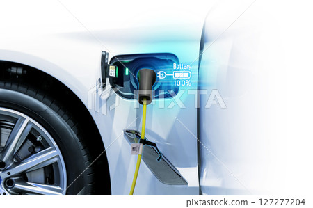 Power cable pump plug in charging power to electric vehicle EV car. 127277204
