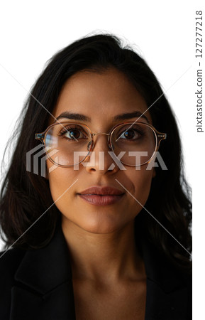 A Latina business leader with sleek hair and oversized glasses, her thoughtful expression illuminated by glowing lines, symbolizing innovation, determination A Latina business leader with sleek hair and oversized glasses, her thoughtful expression illuminated by glowing lines, symbolizing innovation, determination 127277218