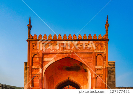Red sandstone gate and blue sky Red sandstone gate and blue sky 127277431