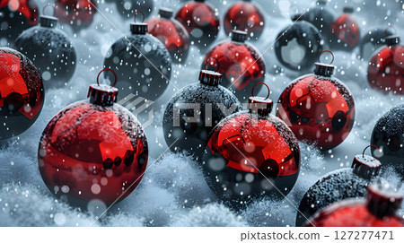 Red and black Christmas baubles in a snowy winter season 127277471