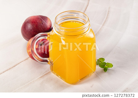 Vitamin beverage - peach juice glass Vitamin beverage - peach juice glass 127278372
