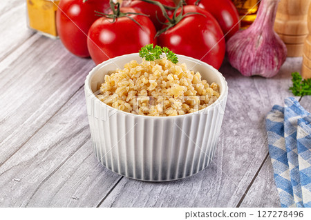 Vegan cuisine - boiled bulgur garnish 127278496