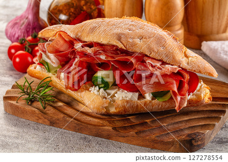 Sandwich with ciabatta and jamon 127278554